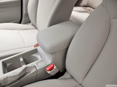 2012 Subaru Impreza front center console with closed lid, from driver's side looking down